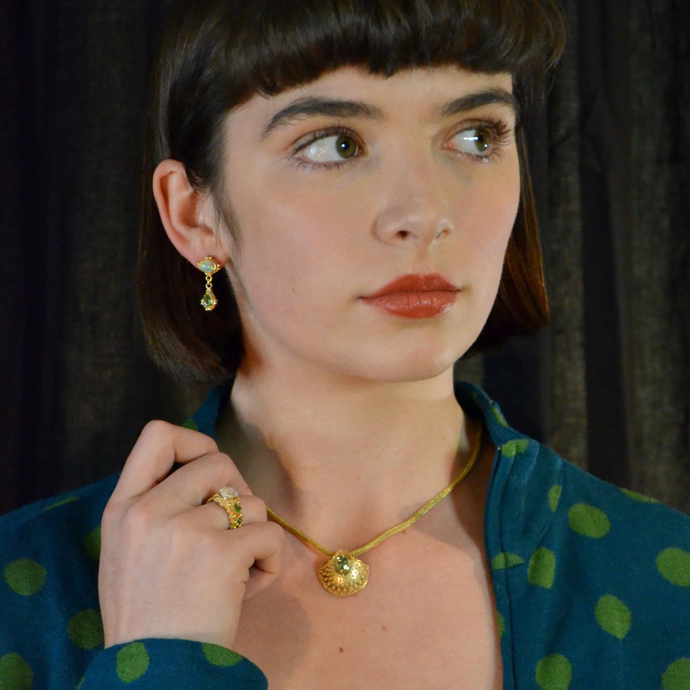 Asymmetrical Moonstone and Green Garnet Ring