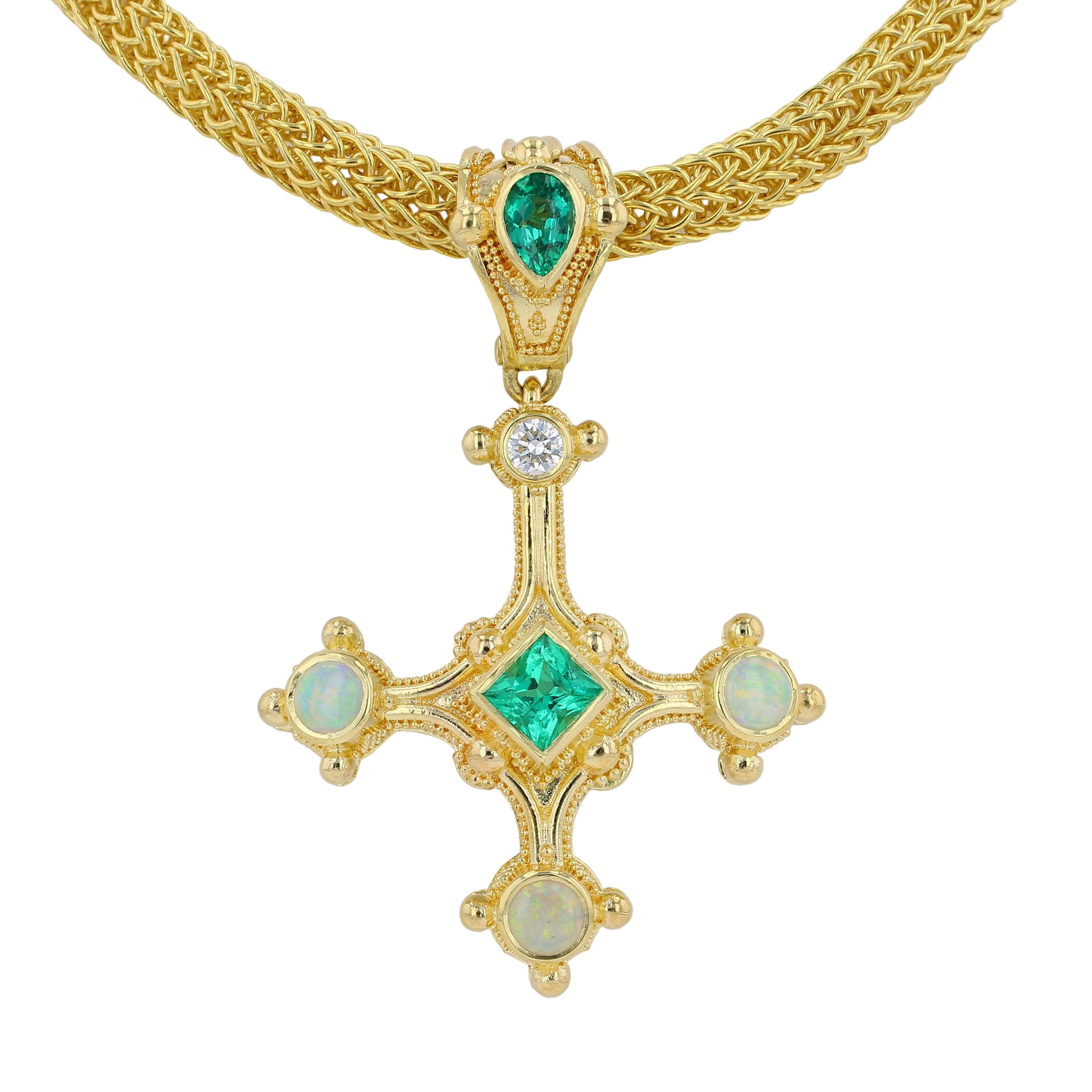 Emerald cross pendant