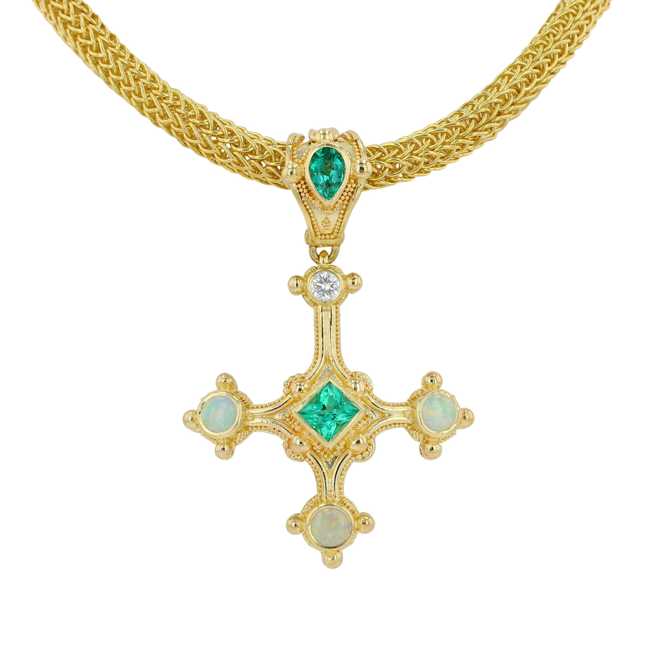 Emerald cross pendant