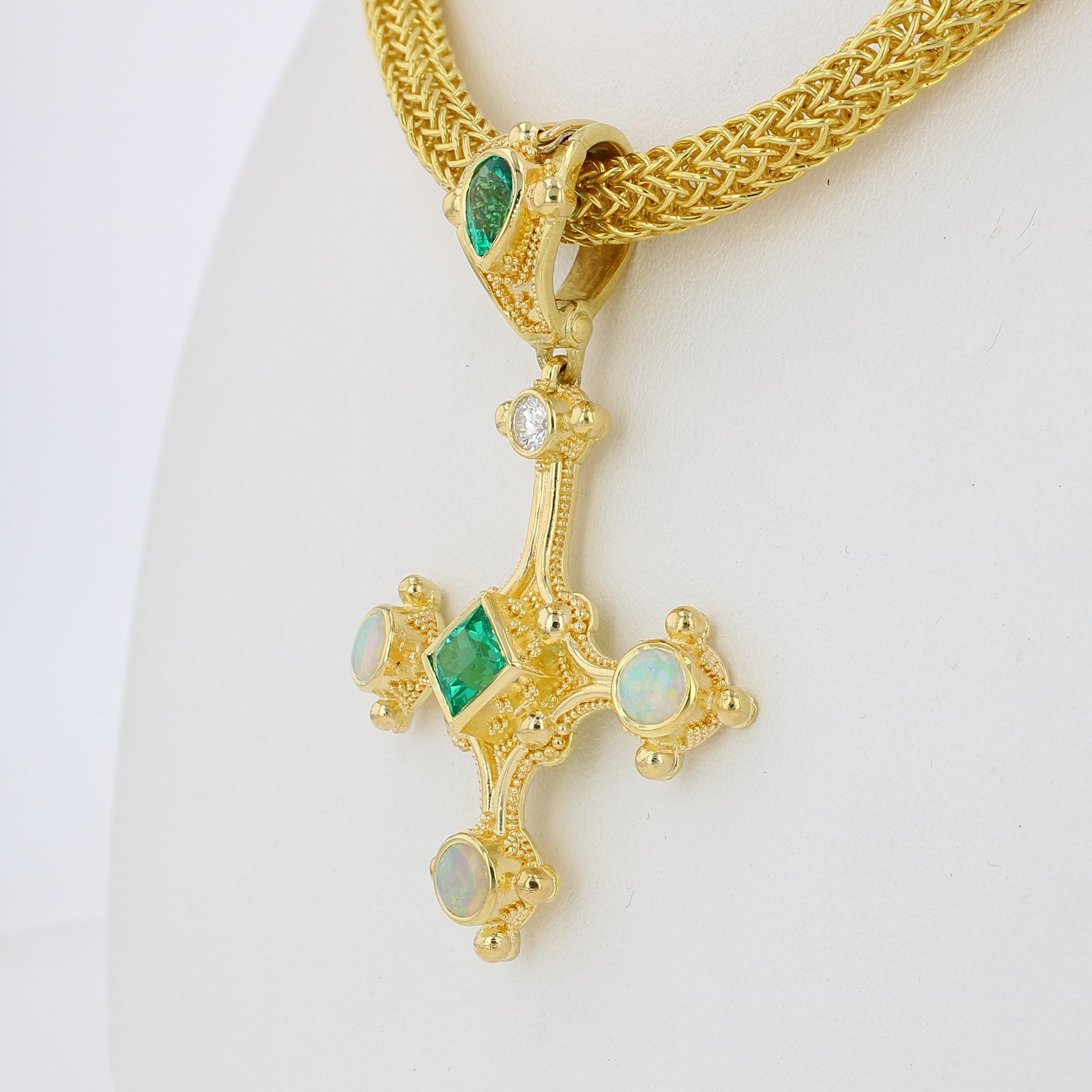 Emerald cross pendant