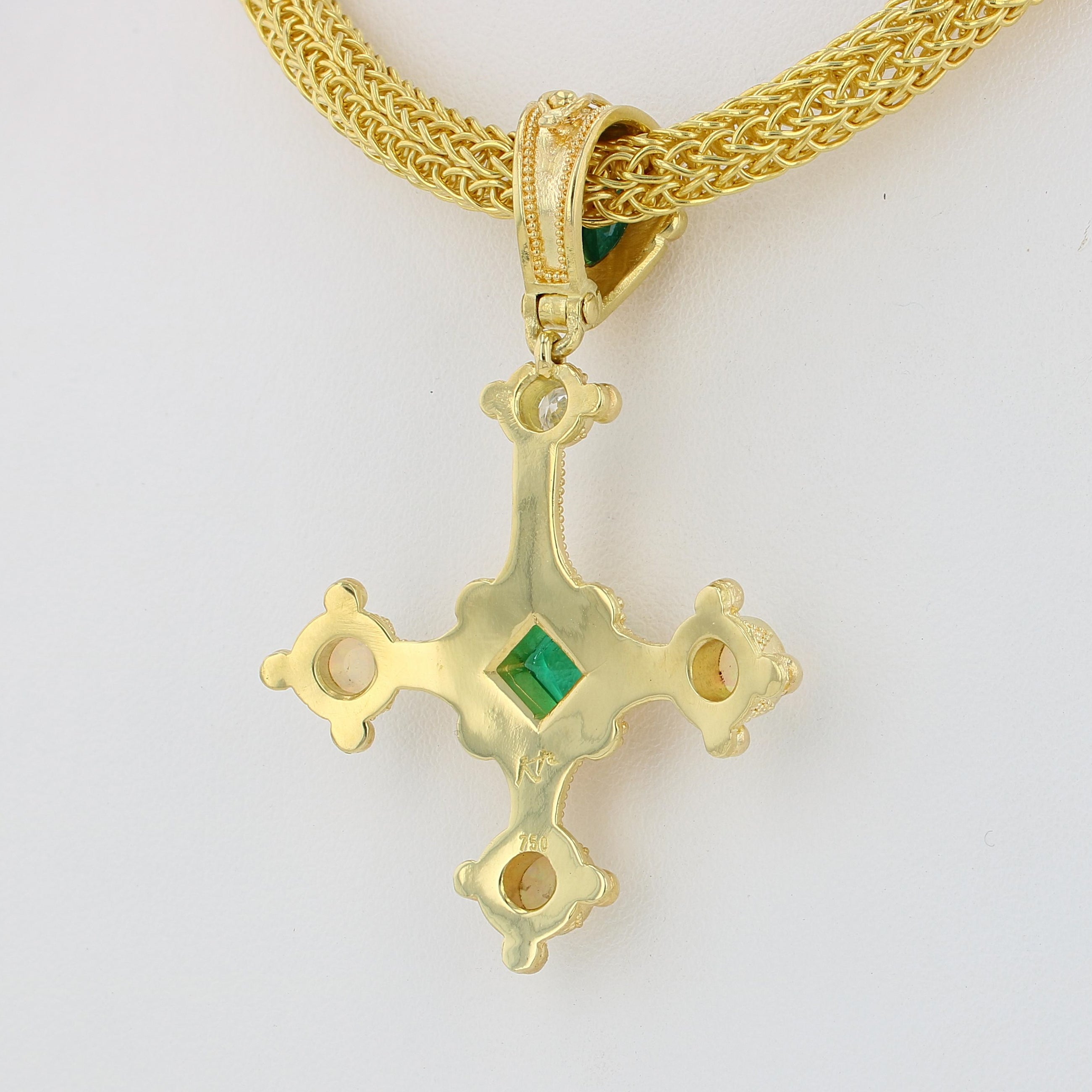 Emerald cross pendant