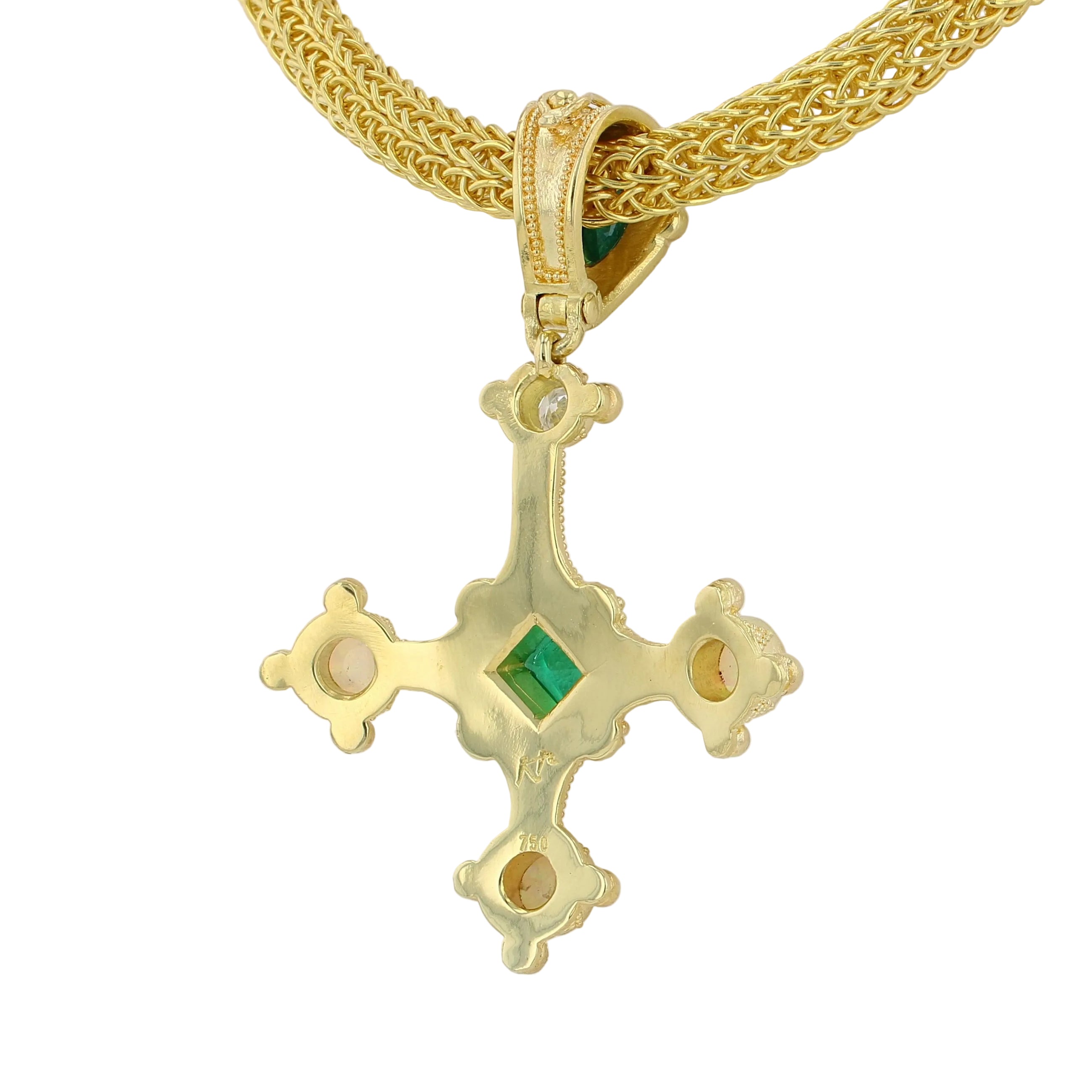 Emerald cross pendant