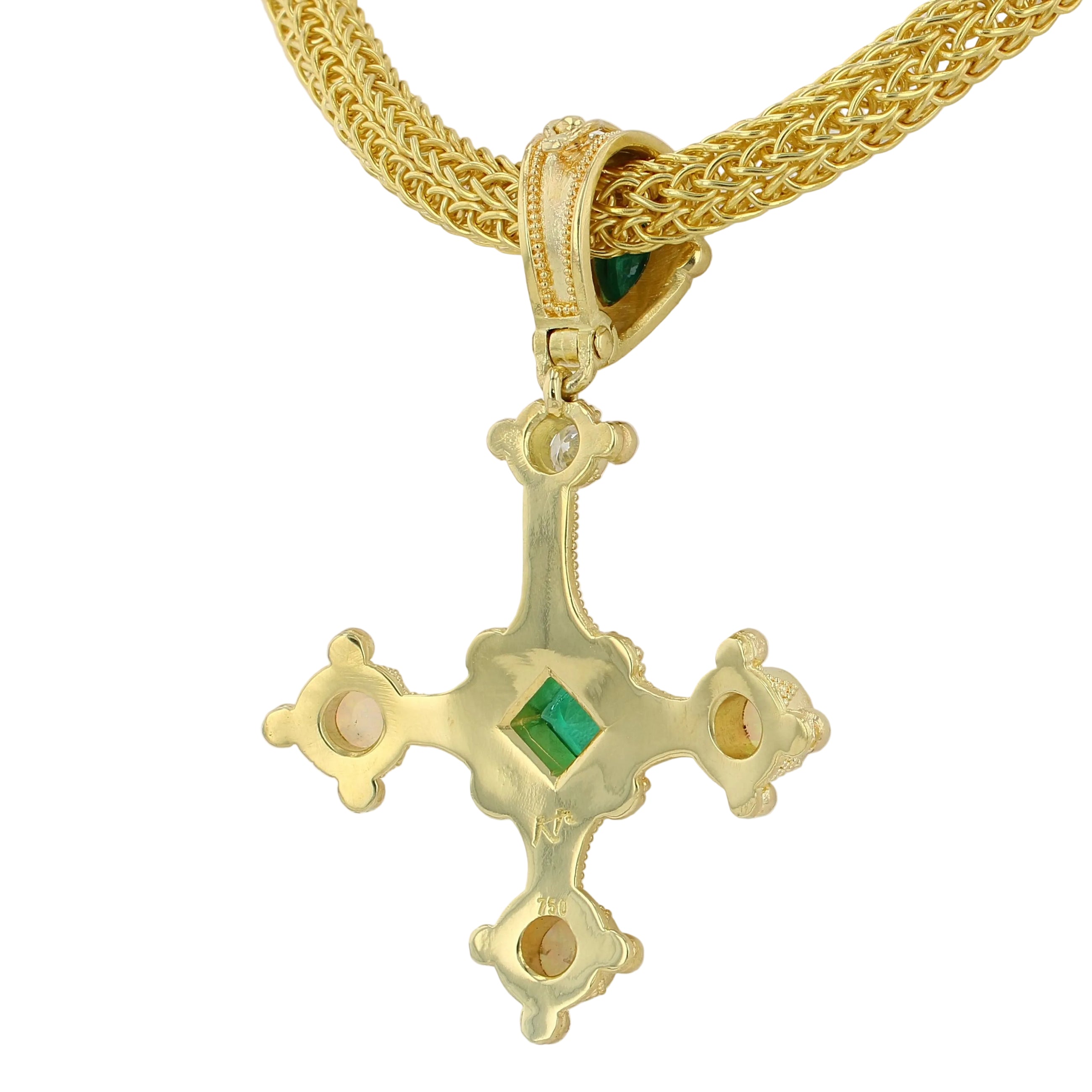 Emerald cross pendant