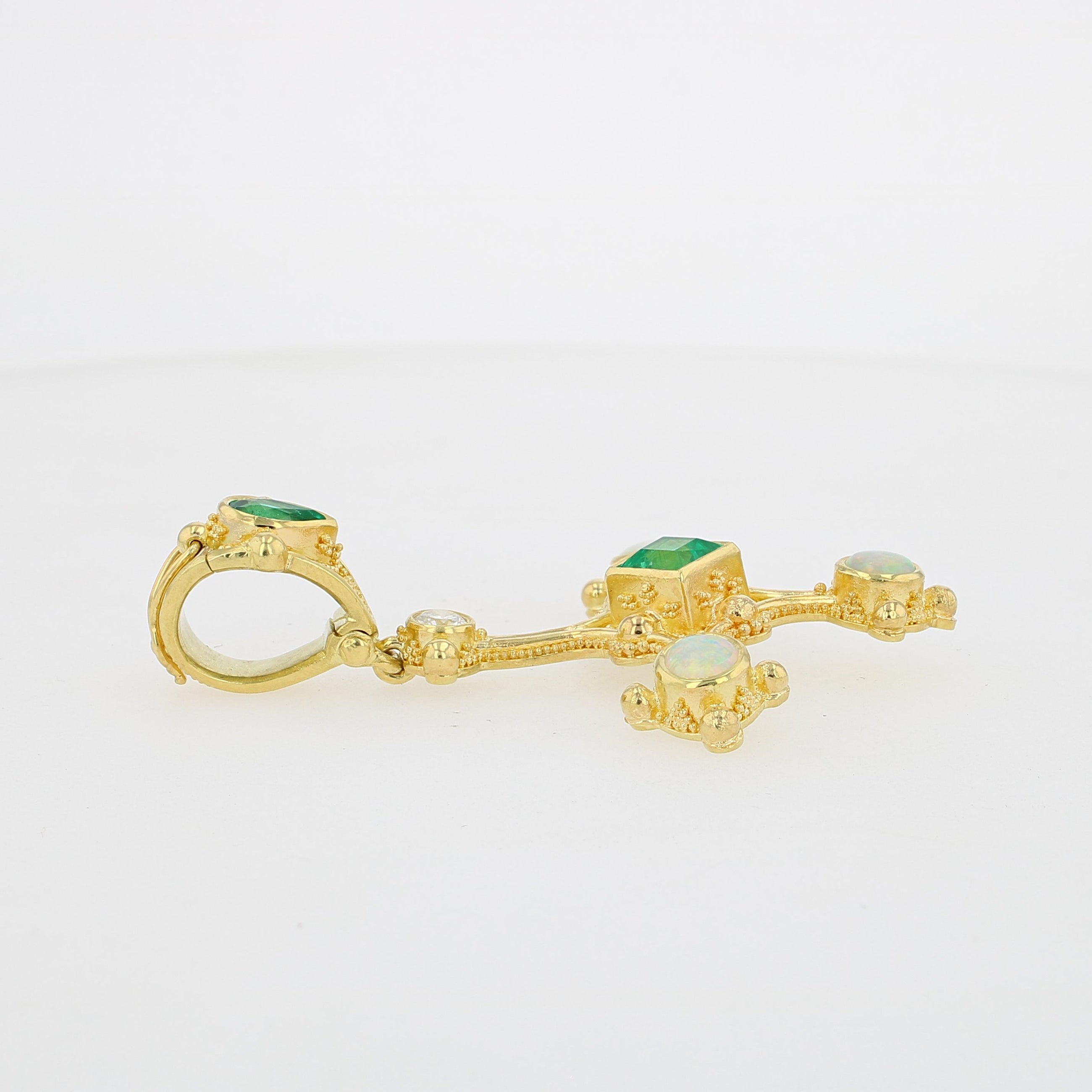 Emerald cross pendant