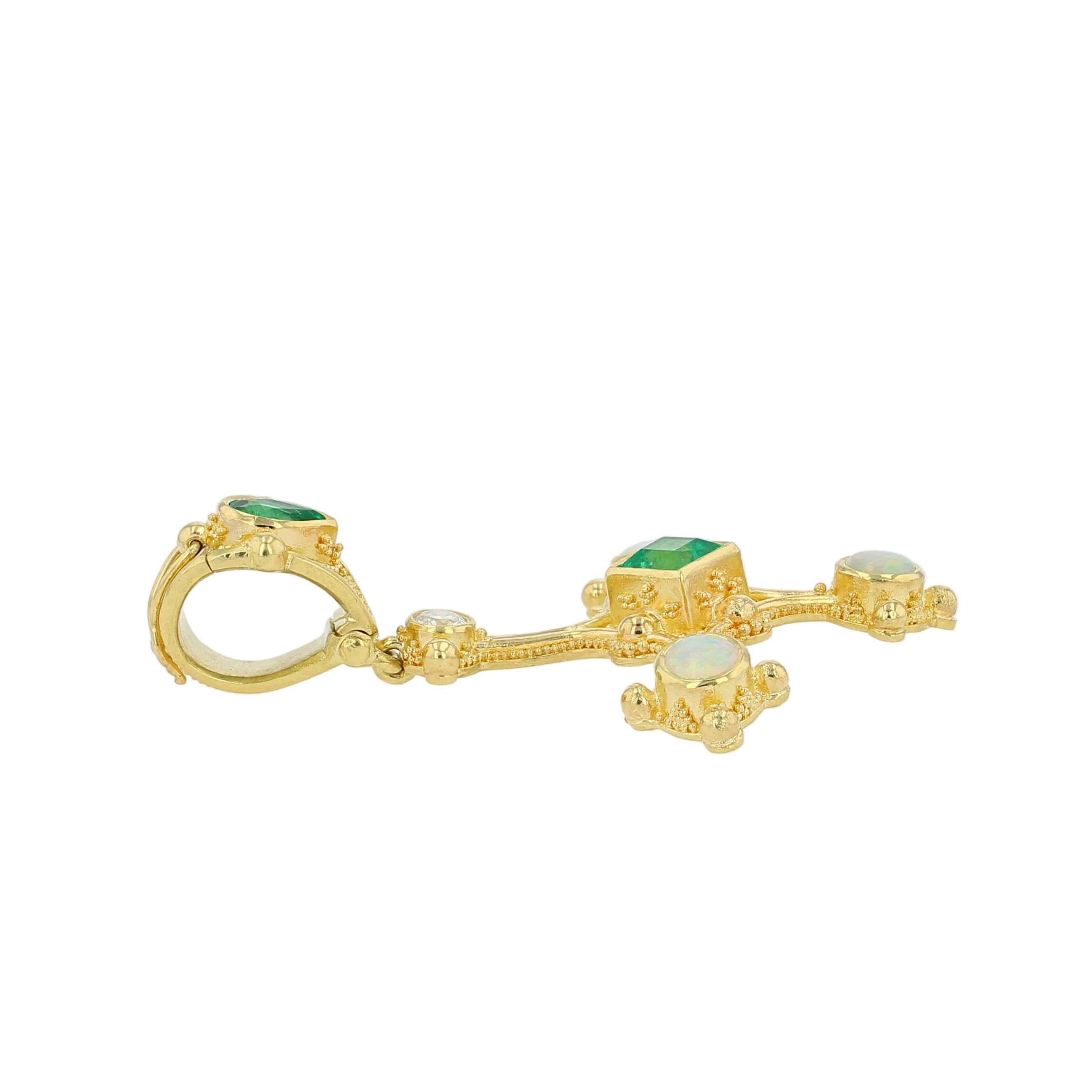 Emerald cross pendant