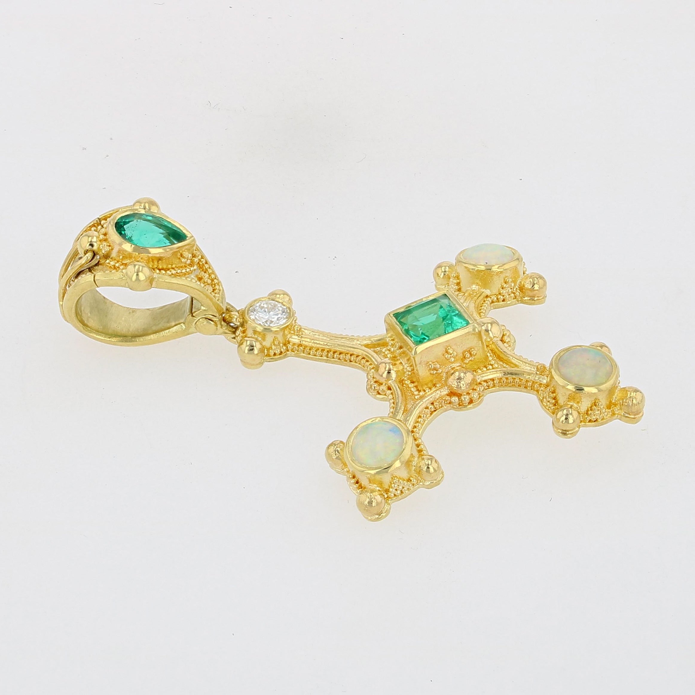 Emerald cross pendant