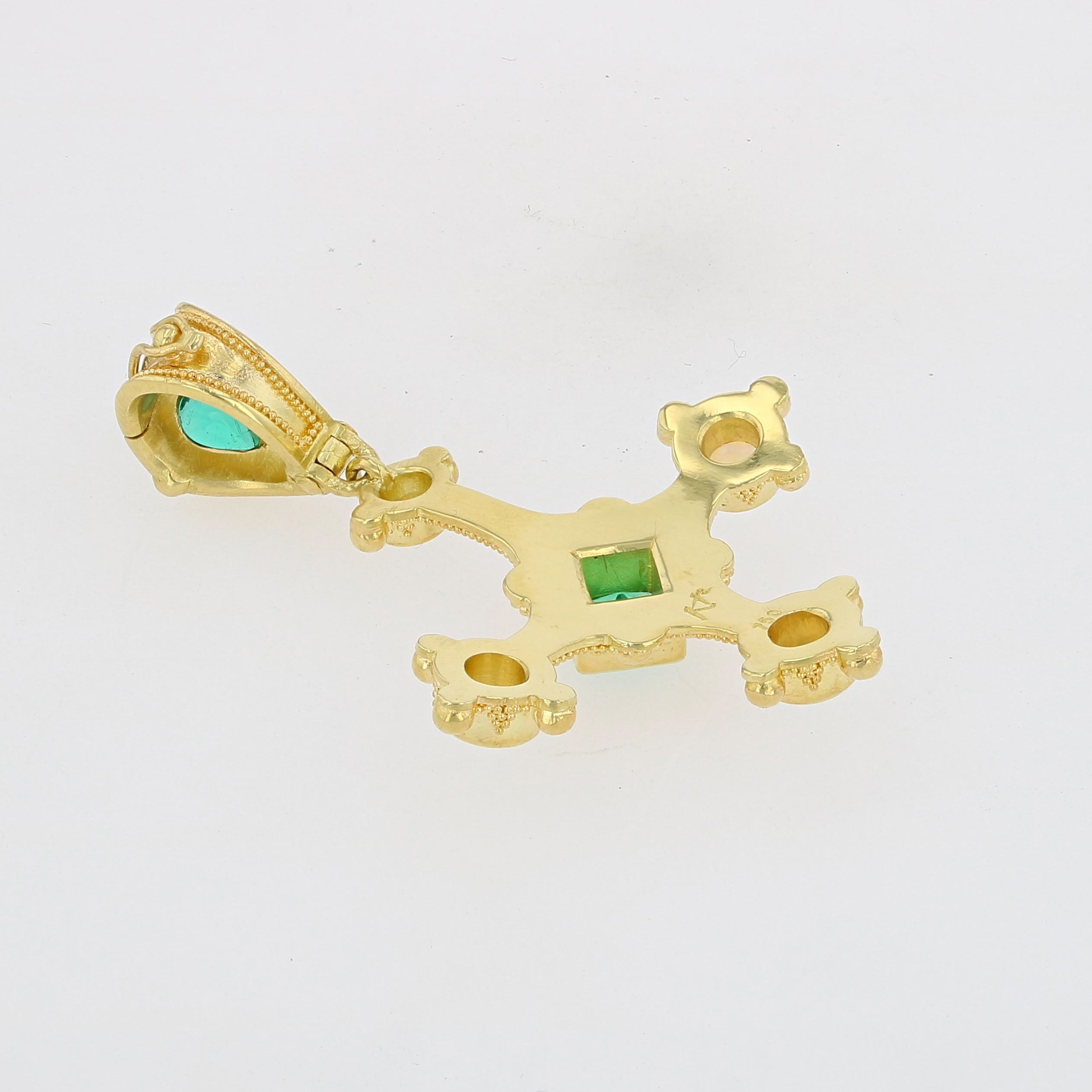 Emerald cross pendant