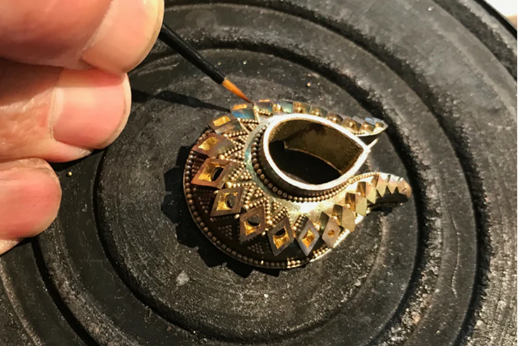 Placing the granules in preparation for fusing