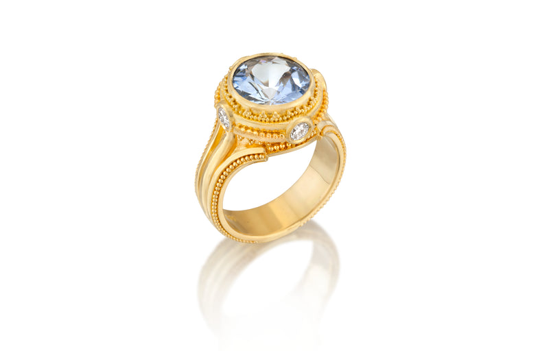 Aquamarine and Diamond Prayer Wheel Ring