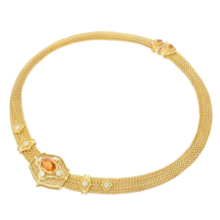 Necklace with hand woven chain: Golden Sapphire 5.54ct, Diamonds DEF VS .80ct, Golden Sapphire (in clasp) 1.18ct, 82.4gr 18k Gold.