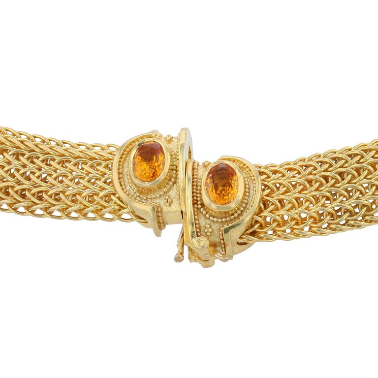 Necklace with hand woven chain: Golden Sapphire 5.54ct, Diamonds DEF VS .80ct, Golden Sapphire (in clasp) 1.18ct, 82.4gr 18k Gold.