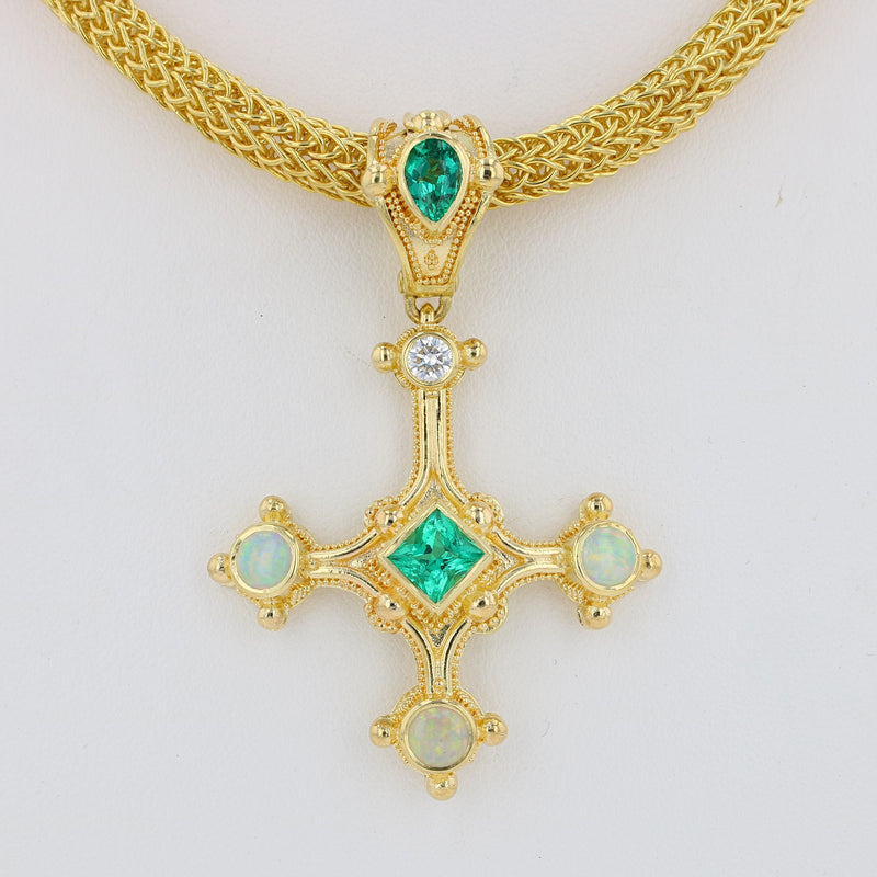 Emerald cross pendant
