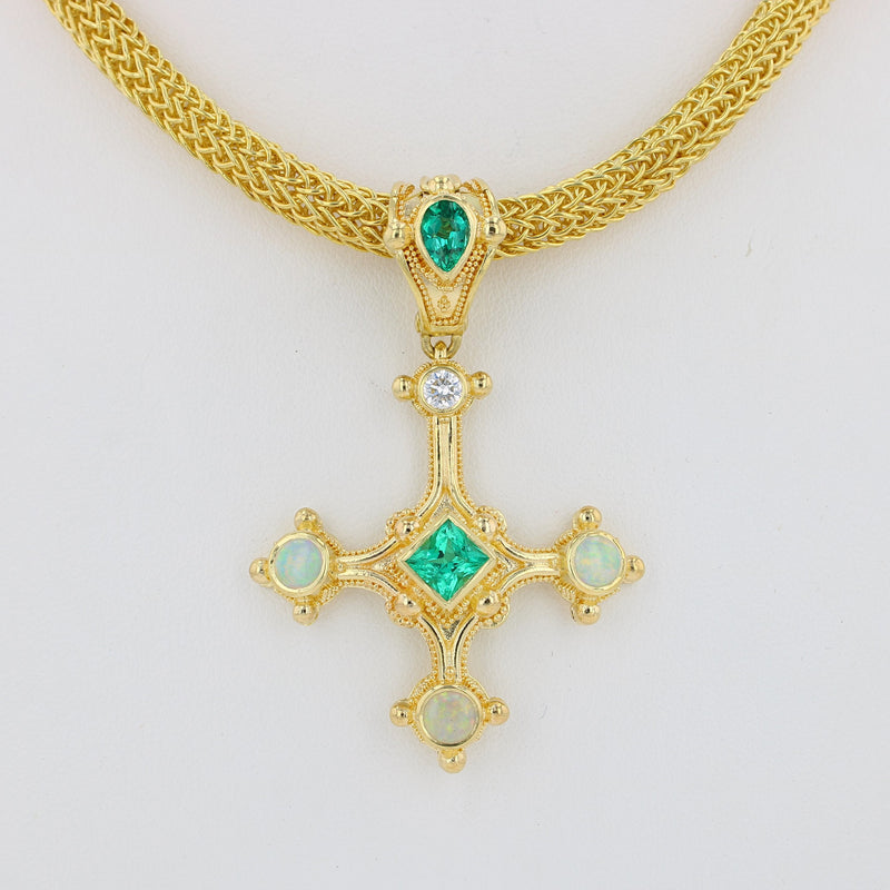 Emerald cross pendant