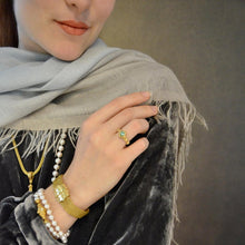 Round Emerald Solitaire Ring with Granulation