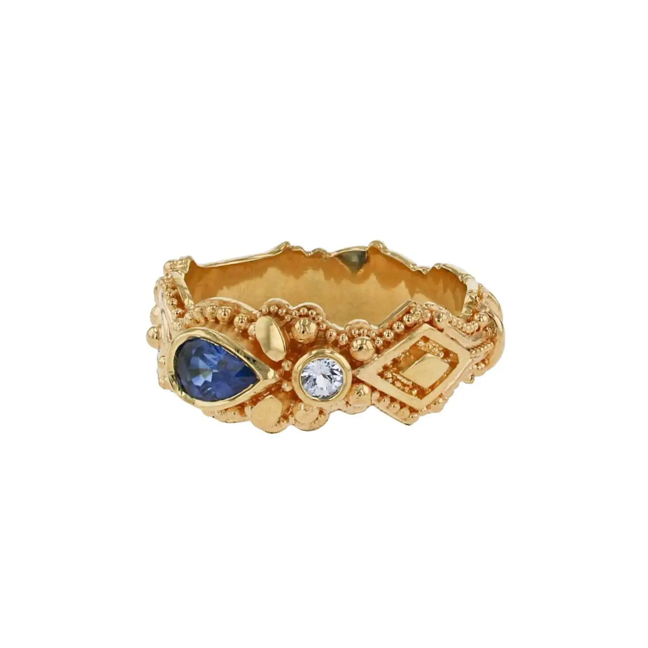 Spontaneity Ring, Blues Sapphire and Intricate Detail