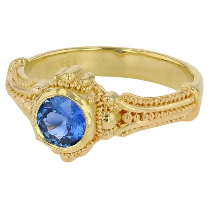 Solitaire Ring with Blue Round Sapphire 0.91ct